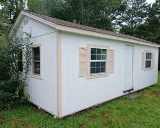 The walls of this outbuilding measure approximately 13.5 ft. x 24 ft.