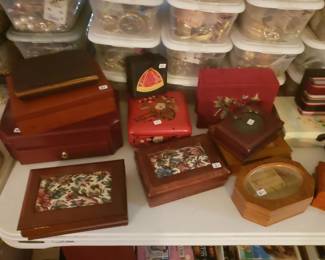 Lots of costume jewelry and jewelry boxes