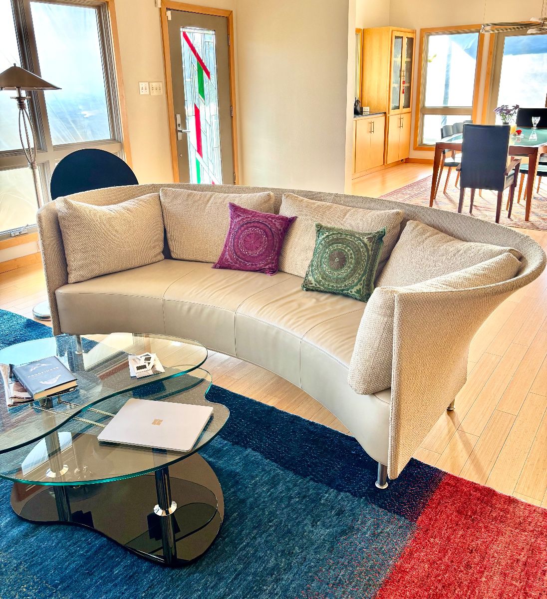 Curved Leather and Fabric Modern Sofa with chrome legs (purchased downtown off 6th street in 2008)