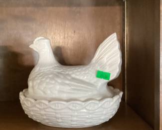 Ceramic hen on nest. Bottom is marked England.