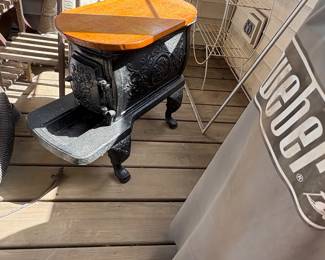 Old cast iron stove made into a table