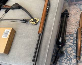 Gun, bow, tripod