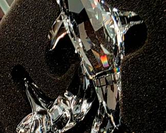 Swarovski clear crystal dolphin group — likely the “Dolphins” SCS/Annual-style piece or a related retired multi-dolphin figurine.