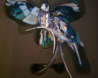 This is a Swarovski Crystal Paradise sculpture titled "Blue Jays" (item number 1176149).