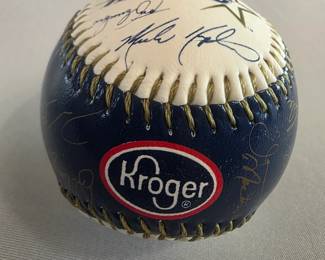 This is a Houston Astros Kroger promotional souvenir baseball with facsimile/printed team signatures — not hand-signed autographs.