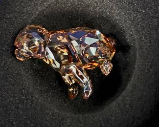 This is the Swarovski Golden Retriever Puppy — Standing, item 1142824. It matches the amber/golden crystal puppy