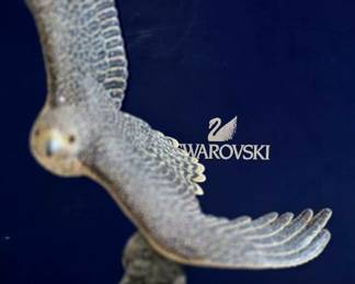 This piece is likely Swarovski Crystal Myriad “Alsaqr Almalaki” / Royal Falcon, a numbered limited edition falcon with pavé crystals. Swarovski/Myriad references describe the Royal Falcon as a high-end limited piece covered in 43,164 hand-set crystals.