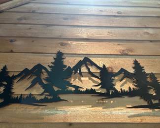 Lot #54 - $28 Plexi glass(?) cutout mountain scene 46" x 17"