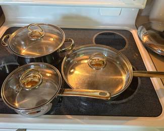 Lot #52 - $22 - 3 stainless pots and skillet with lids - no name on bottom