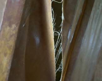 Lot #56 - detail of crack in material covering kayak