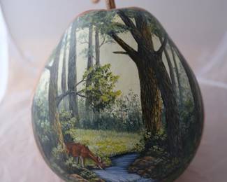 Hand-painted gourd featuring a forest scene