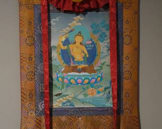 Up for sale is an authentic, hand-painted Tibetan Thangka depicting Manjushri (the Bodhisattva of Transcendent Wisdom), framed within a large traditional silk brocade mount.  This piece is rendered in the distinctive eastern Tibetan Karma Gadri painting style, celebrated for its airy minimalism, fine calligraphic linework, translucent cloud washes, and a vast, calm natural landscape that makes the central deity radiate from the canvas.   • Overall Dimensions: 33" W x 52" H (inclusive of the entire textile brocade) • Subject: Manjushri  • Style/School: Karma Gadri Tradition • Presentation: Framed with a multi-layered ornamental silk border, complete with its top hanging suspension cords and bottom wooden roller weight. • Condition: Excellent condition. The painted canvas shows vibrant mineral pigments and crisp lines. Fabric borders are clean, structurally sound, and ready for immediate wall mounting.