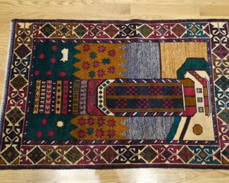 34" x 53" (approximately 2.8 x 4.4 feet) is the precise size of this specific hand-knotted Afghan Baluch rug.This dimensions profile is very typical for tribal nomadic weavers, who traditionally crafted small, transportable textiles on portable looms. 