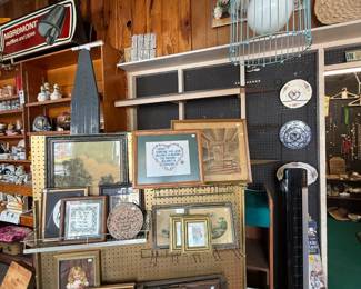 This peg board with pictures will be outside the day of the sale