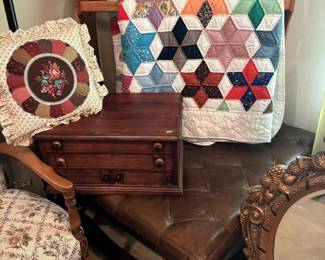 Both quilts, quilt rack, and 3 drawer chest sold