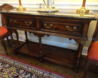 Henredon Sideboard features a marble top