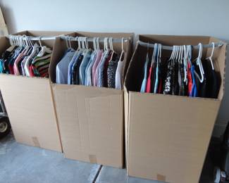 More nice stylish clothes (M) we couldn't fit them all inside!