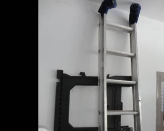 Pair of saw horses and extension ladder