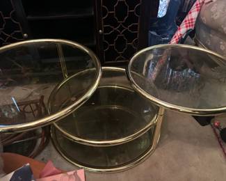 Smoky glass and brass coffee table, circles rotate to open or rotate to stack
