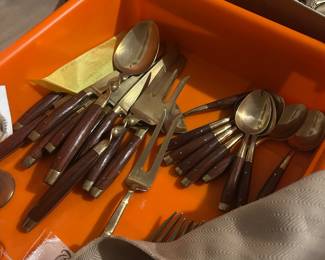 Mid-century wool and brass flatware
