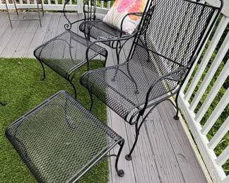 Two Chairs with Ottomans