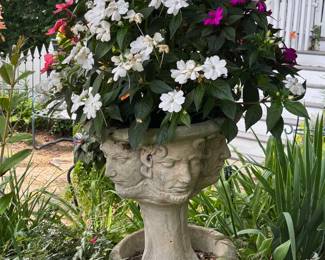 Interesting Sculpted Faces Garden Planter