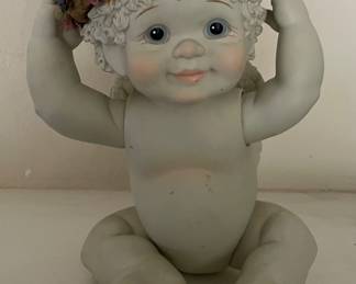 PORCELAIN JOINTED CHERUB FIGURE