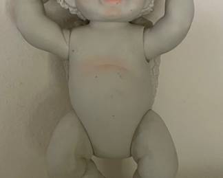 PORCELAIN JOINTED CHERUB FIGURE