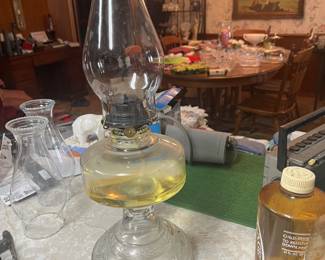 Oil lamp with extra bottle of oil 