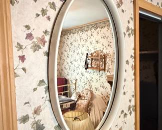 Oval Wall Mirror with White Frame and Floral Detail