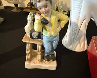 Porcelain Figurine of a Boy with a Dog