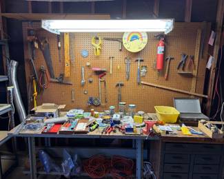 Drill bits, nails, files, wire, hand riveter, socket wrench set, saws, vices, hammers, hand clamps, yard sticks, screws, nails, dremel, wire cutters, saw horses and ladder