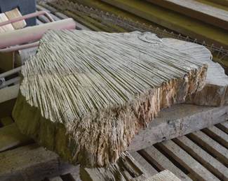 Stacked Rough-Cut Dimensional Lumber Boards with Natural Edge Wood Slabs