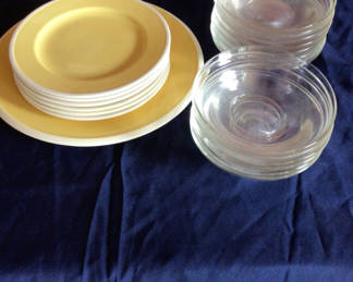 Lot 30: Yellow charger plate with white dinner plates and glass bowls