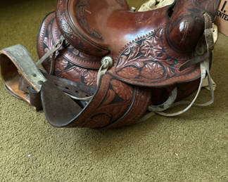 Lot 104: Leather Western saddle with floral tooling