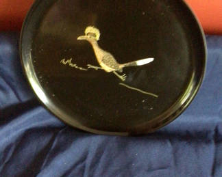 Lot 43: Round black Couroc tray lid with bird inlay