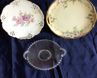 Lot 47: Floral porcelain plates and a beaded-edge glass serving dish