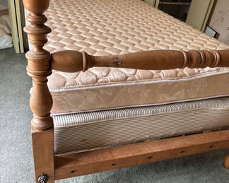 Lot 79: Wooden bed frame with turned posts and mattress
