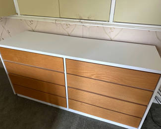 Lot 81: White and wood eight-drawer dresser