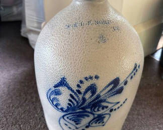 Lot 85: Stoneware jug with cobalt blue floral motif
