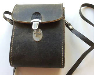 Lot 8: Leather carrying case with compact binoculars