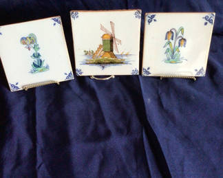 Lot 45: Three Delftware tiles with windmill and tulip designs