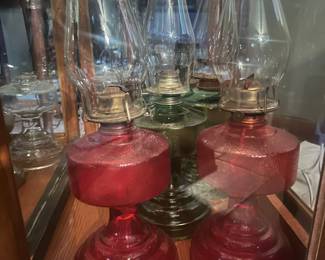 Large collection of oil lamps