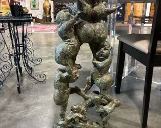 Bronze sculpture of stacked people