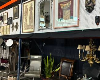 Office chairs and chandelier and art work