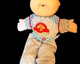Cabbage Patch doll/has more clothes