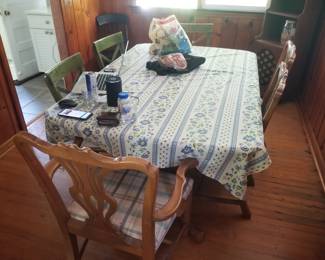 Dining table with extra leaves; chairs