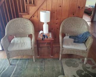 Wicker chairs; end table; table lamp