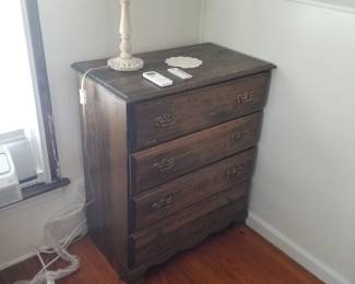 Dresser; table lamp
