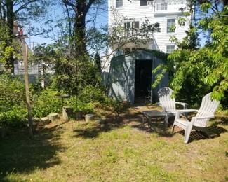 Plastic Adirondack chairs; shed